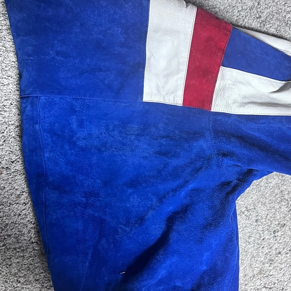 Leather bomber jacket. Never word, small cuff marks. Looks amazing! - Picture 1 of 4